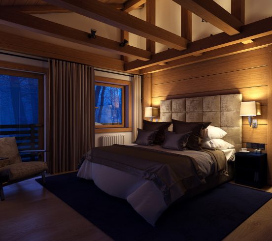 3D rendering cozy bedroom is in the attic of a chalet. Huge bed with numerous pillows dominates the room. The interior is decorated with wood and natural materials.